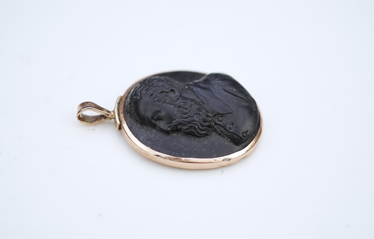 An unusual lava cameo pendant, late 19th century
